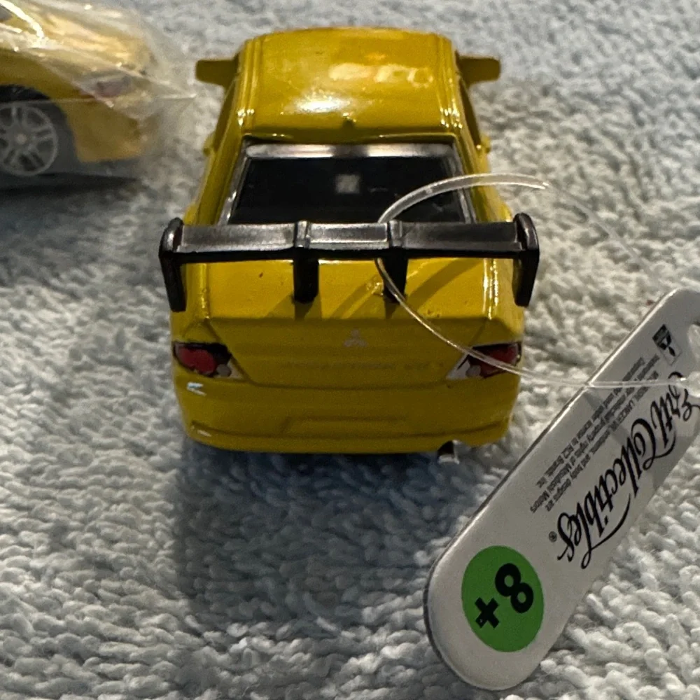 NWT ERTL Collectibles 2002 Mitsubishi Lancer Evolution Die Cast Model set of 2